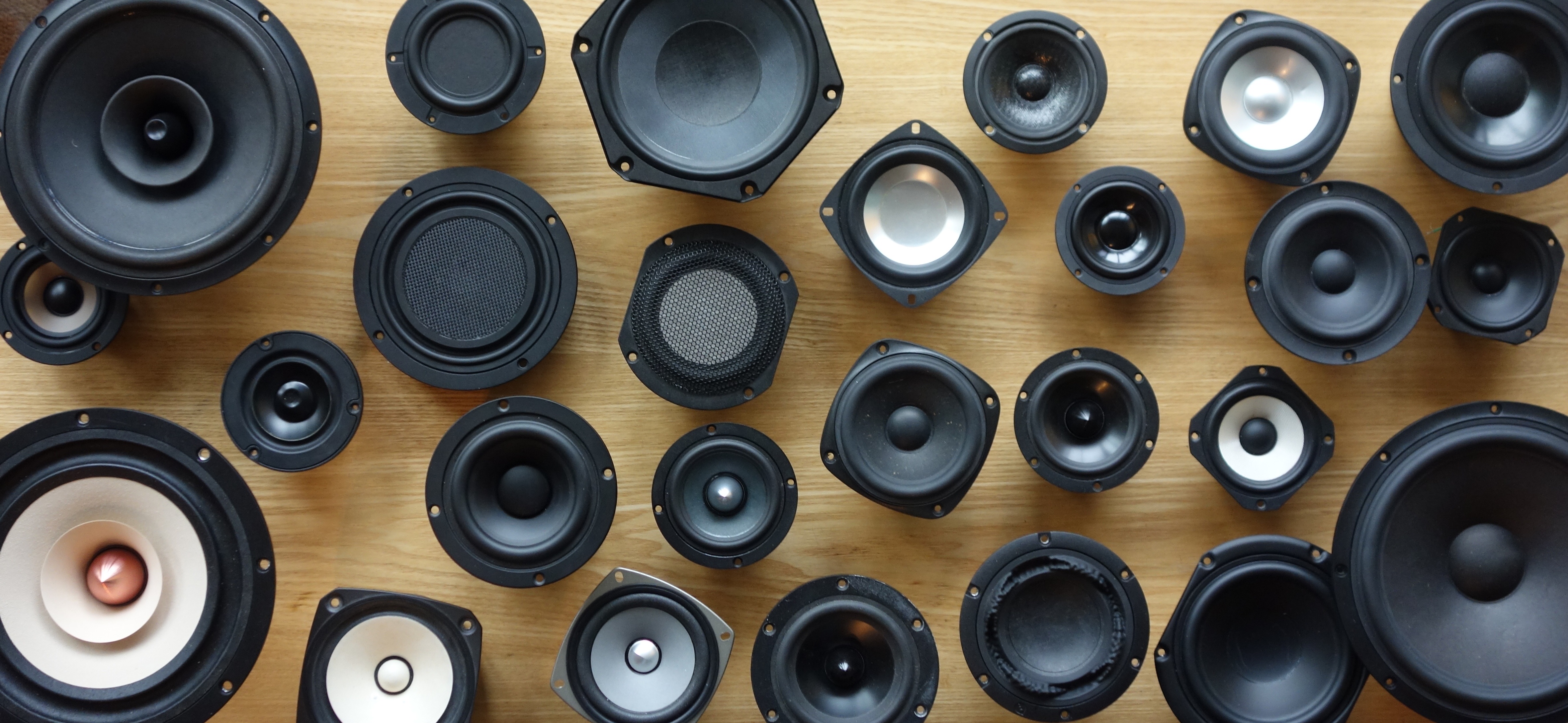 Array of loudspeaker drivers arranged on a table